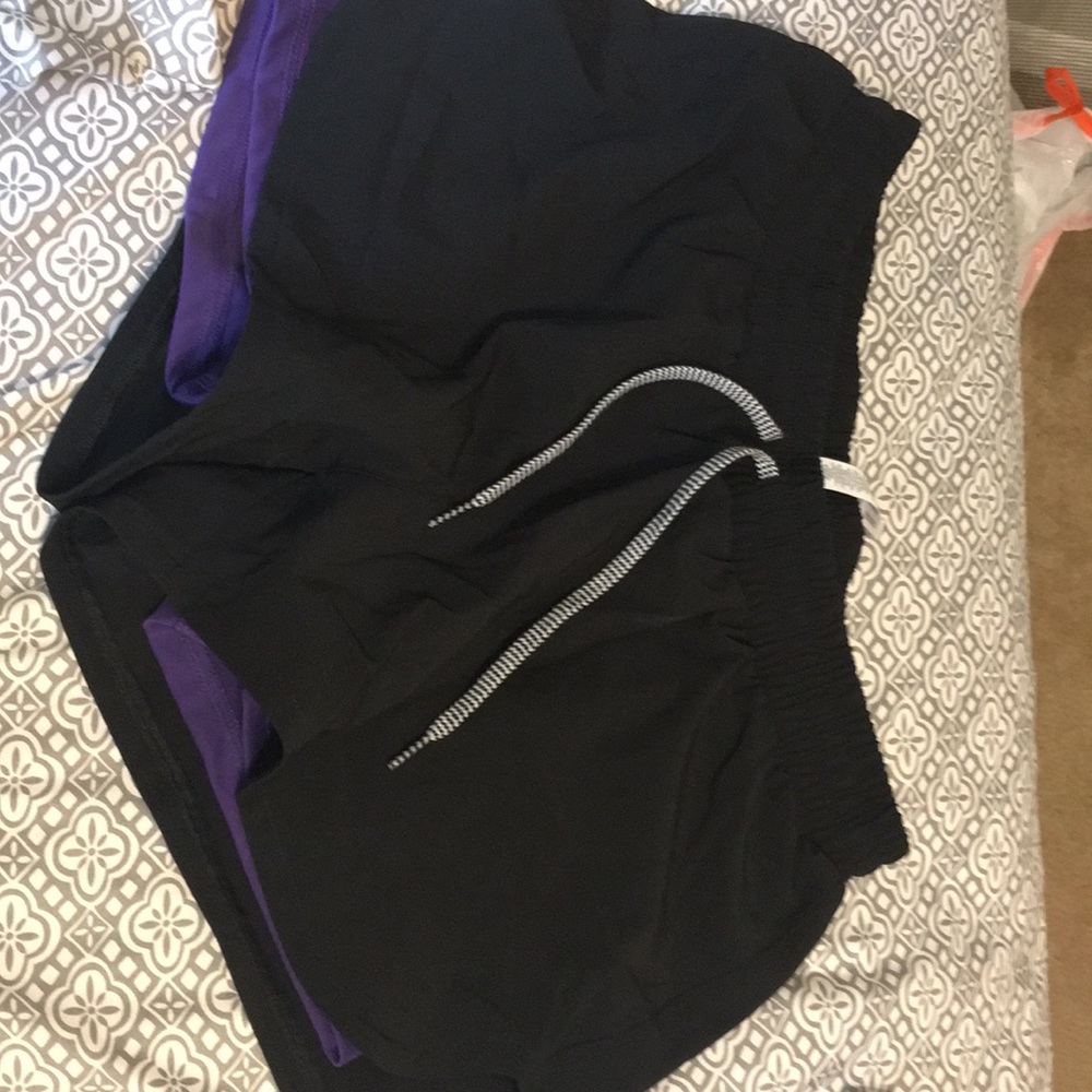 Black and purple Adidas shorts